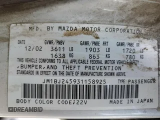 2003 Mazda Protege z VIN JM1BJ245931158925, wystawiony jako Copart lot #60086785 z przebiegiem 347 952 mil mil oraz Czysty tytuł • Clean title. Historia ofert i sprzedaży dostępna na DreamBid. Obrazek 13.