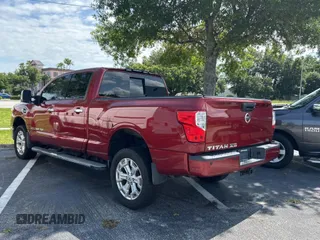 2016 Nissan Titan SL z VIN 1N6BA1F26GN512666, wystawiony jako Copart lot #59731495 z przebiegiem 120 182 mil mil oraz Czysty tytuł • Clean title. Historia ofert i sprzedaży dostępna na DreamBid. Obrazek 3.
