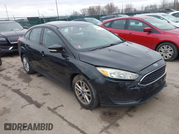 2015 Ford Focus SE with VIN 1FADP3F21FL355666, listed as a IAAI auction lot 41828579 with 110,002 mi miles. Bid and sale history available at carsss.com. Image 1.