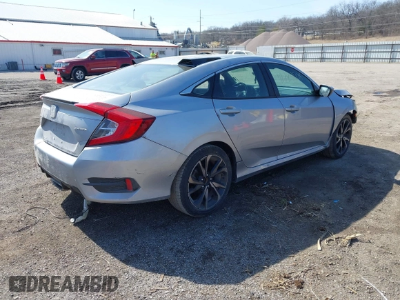 2021 Honda Civic Sport with VIN 2HGFC2F83MH540939, listed as a IAAI auction lot 41789508 with 100,274 mi miles and . Bid and sale history available at DreamBid. Image 4.