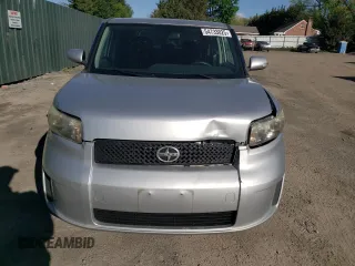 2010 Scion xB with VIN JTLZE4FEXA1098327, listed as a Copart auction lot 54733025 with 151,331 mi miles and Salvage Title. Bid and sale history available at DreamBid. Image 5.