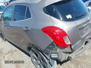 2014 Buick Encore with VIN KL4CJASB4EB783635, listed as a IAAI auction lot 41816882 with 134,758 mi miles. Bid and sale history available at carsss.com. Image 3.