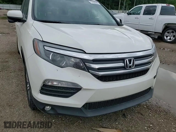 2018 Honda Pilot EX-L with VIN 5FNYF5H52JB023815, listed as a Copart auction lot 57692995 with 65,065 mi miles and Salvage title. Bid and sale history available at DreamBid. Image 14.