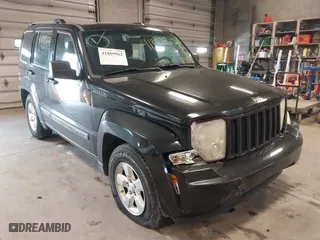 2009 Jeep Liberty Sport with VIN 1J8GN28K79W547903, listed as a IAAI auction lot 41889962 with 127,821 mi miles. Bid and sale history available at carsss.com. Image 6.