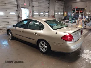 2001 Ford Taurus SES with VIN 1FAFP55S31A143202, listed as a IAAI auction lot 41950702 with 238,193 mi miles. Bid and sale history available at carsss.com. Image 3.