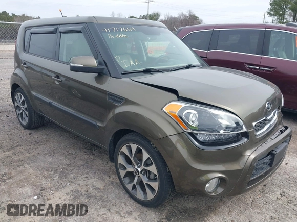 2012 Kia Soul + with VIN KNDJT2A62C7465580, listed as a IAAI auction lot 41717664 with 70,699 mi miles. Bid and sale history available at carsss.com. Image 1.