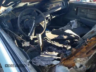 1985 Chevrolet Monte Carlo Sport с VIN 1G1GZ37Z2FR127808, выставлен на аукционе Copart как лот 76112524 с пробегом Не указан миль и Списание • Salvage title. История ставок и продаж доступна на DreamBid. Изображение 8.