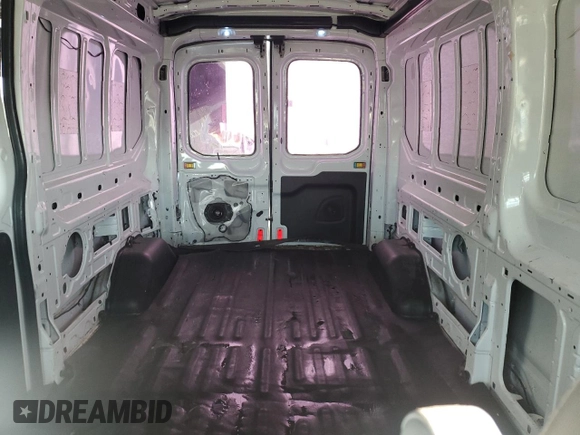 2015 Ford Transit Cargo with VIN 1FTNR2CG1FKA07097, listed as a Copart auction lot 61985765 with 74,100 mi miles and Salvage title. Bid and sale history available at DreamBid. Image 10.
