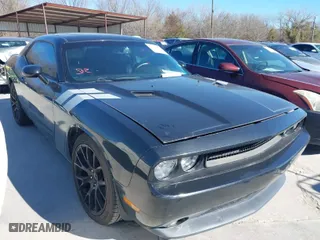 2014 Dodge Challenger SXT with VIN 2C3CDYAG8EH196157, listed as a IAAI auction lot 41730855 with 112,354 mi miles. Bid and sale history available at carsss.com. Image 1.