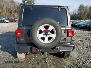 2020 Jeep Wrangler Unlimited Sport with VIN 1C4HJXDM7LW277445, listed as a Copart auction lot 82929714 with 27,570 mi miles and Salvage title. Bid and sale history available at DreamBid. Image 6.