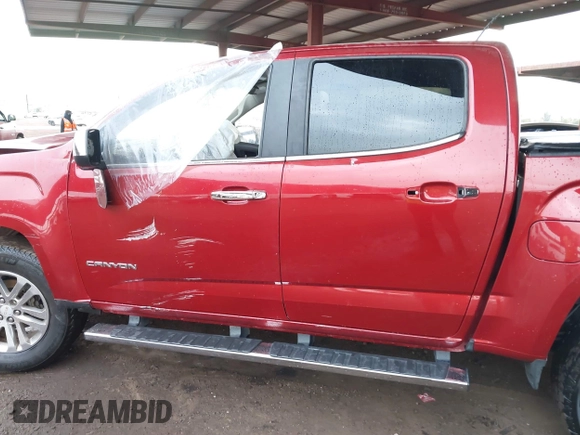 2015 GMC Canyon 2WD SLT with VIN 1GTG5CE39F1225427, listed as a IAAI auction lot 41453753 with 115,801 mi miles. Bid and sale history available at carsss.com. Image 13.