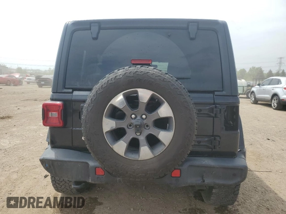 2018 Jeep Wrangler Unlimited Sahara with VIN 1C4HJXEG0JW141101, listed as a Copart auction lot 56573195 with 143,854 mi miles and Salvage title. Bid and sale history available at DreamBid. Image 6.