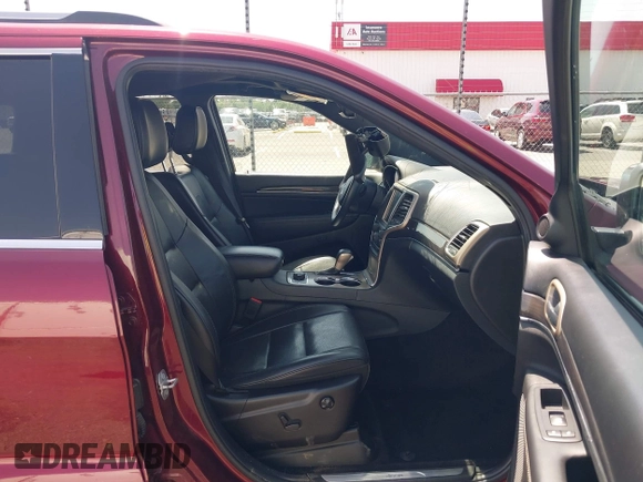 2017 Jeep Grand Cherokee Overland with VIN 1C4RJFCG7HC658943, listed as a IAAI auction lot 42282213 with 103,291 mi miles and . Bid and sale history available at DreamBid. Image 5.