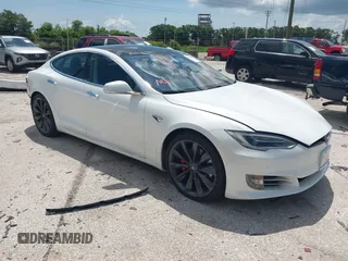 2017 Tesla Model S 100D with VIN 5YJSA1E45HF189006, listed as a IAAI auction lot 42540693 with 64,827 mi miles and . Bid and sale history available at DreamBid. Image 1.