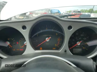 2003 Nissan 350Z Performance z VIN JN1AZ34D63T102739, wystawiony jako Copart lot #55443655 z przebiegiem 162 672 mil mil oraz Tytuł czysty. Historia ofert i sprzedaży dostępna na DreamBid. Obrazek 9.