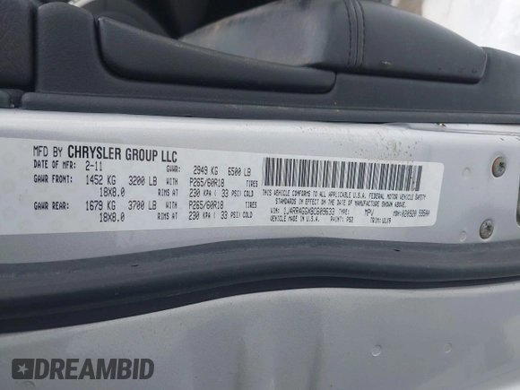 2011 Jeep Grand Cherokee 70th Anniversary with VIN 1J4RR4GGXBC609633, listed as a IAAI auction lot 41469526 with 138,439 mi miles. Bid and sale history available at carsss.com. Image 9.