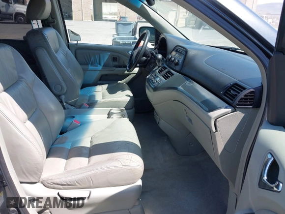 2005 Honda Odyssey TOURING with VIN 5FNRL38885B082482, listed as a IAAI auction lot 41879897 with 159,667 mi miles. Bid and sale history available at carsss.com. Image 5.