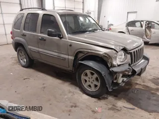 2003 Jeep Liberty Sport with VIN 1J4GL48K83W652993, listed as a IAAI auction lot 41086140 with 115,177 mi miles and . Bid and sale history available at DreamBid. Image 1.
