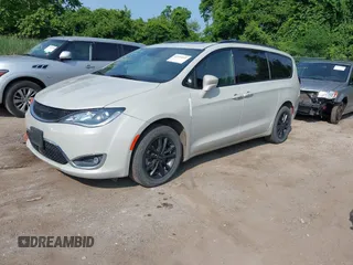 2020 Chrysler Pacifica Launch Edition with VIN 2C4RC3BGXLR267876, listed as a IAAI auction lot 42424841 with 87,586 mi miles and . Bid and sale history available at DreamBid. Image 18.