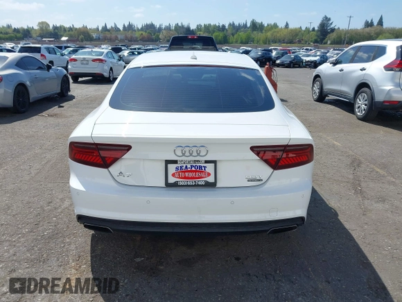 2016 Audi A7 Prestige with VIN WAU2GAFC1GN158272, listed as a IAAI auction lot 42012170 with 99,775 mi miles and . Bid and sale history available at DreamBid. Image 17.