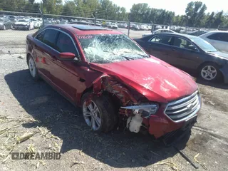 2014 Ford Taurus SEL with VIN 1FAHP2E87EG139913, listed as a IAAI auction lot 40216089 with 95,336 mi miles and . Bid and sale history available at carsss.com. Image 1.
