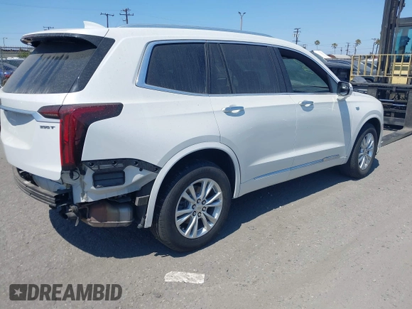 2021 Cadillac XT6 Luxury with VIN 1GYKPAR47MZ221123, listed as a IAAI auction lot 42374772 with 69,829 mi miles and . Bid and sale history available at DreamBid. Image 4.
