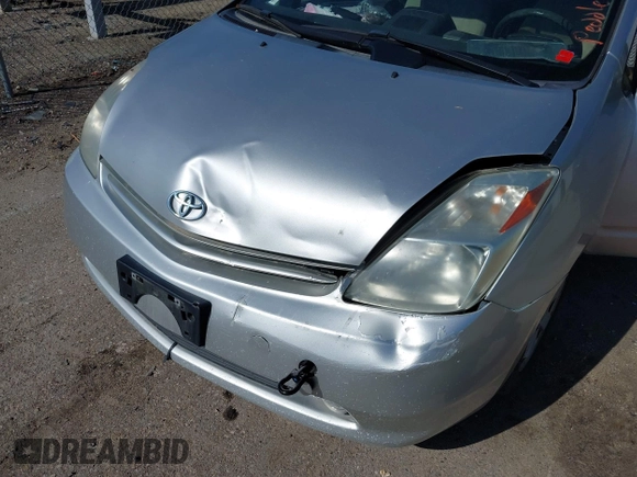 2005 Toyota Prius with VIN JTDKB20UX57054812, listed as a IAAI auction lot 42145700 with 171,163 mi miles. Bid and sale history available at carsss.com. Image 6.