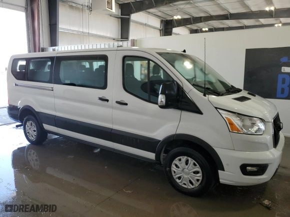 2022 Ford Transit Passenger Wagon XL with VIN 1FBAX2Y87NKA84176, listed as a Copart auction lot 50800985 with 77,909 mi miles and Clean Title. Bid and sale history available at carsss.com. Image 4.