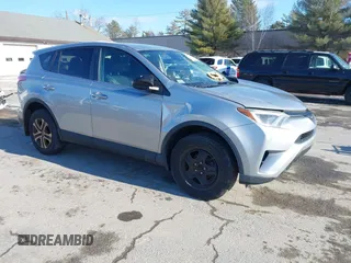 2018 Toyota RAV4 LE with VIN 2T3BFREV7JW728587, listed as a IAAI auction lot 41312419 with 103,134 mi miles. Bid and sale history available at carsss.com. Image 1.