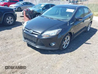 2013 Ford Focus Titanium with VIN 1FADP3J22DL106166, listed as a IAAI auction lot 42233351 with 108,300 mi miles and . Bid and sale history available at carsss.com. Image 2.