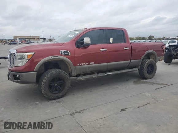2016 Nissan Titan XD PRO-4X with VIN 1N6BA1F45GN500008, listed as a Copart auction lot 77282724 with 119,868 mi miles and Clean Title. Bid and sale history available at carsss.com. Image 1.