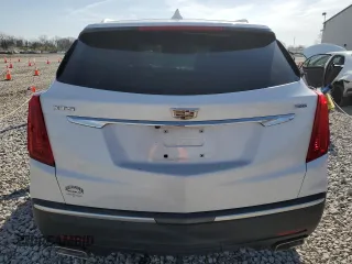 2018 Cadillac XT5 Premium Luxury FWD z VIN 1GYKNERS3JZ139719, wystawiony jako Copart lot #52436595 z przebiegiem Nie podano mil oraz Szkody całkowita. Historia ofert i sprzedaży dostępna na DreamBid. Obrazek 6.