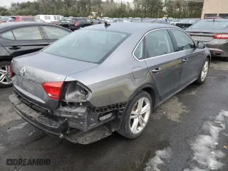 2014 Volkswagen Passat SE with VIN 1VWBP7A38EC018710, listed as a Copart auction lot 42289915 with 100,595 mi miles and Salvage Title. Bid and sale history available at carsss.com. Image 3.