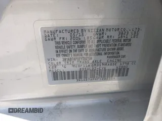 2015 Nissan Sentra S with VIN 3N1AB7APXFY282104, listed as a IAAI auction lot 42004565 with 136,077 mi miles. Bid and sale history available at carsss.com. Image 9.