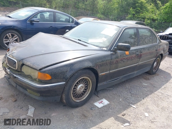1999 BMW 7 Series 740il with VIN WBAGH8334XDP01166, listed as a IAAI auction lot 42073939 with 1 mi miles. Bid and sale history available at carsss.com. Image 2.