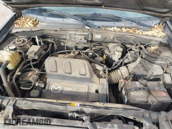 2001 Mazda Tribute LX with VIN 4F2CU08191KM27990, listed as a IAAI auction lot 41487001 with 209,394 mi miles and . Bid and sale history available at carsss.com. Image 10.