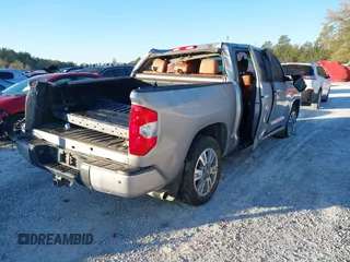 2016 Toyota Tundra Platinum z VIN 5TFGW5F13GX203962, wystawiony jako IAAI lot #41808245 z przebiegiem 179 511 mil mil oraz . Historia ofert i sprzedaży dostępna na DreamBid. Obrazek 4.