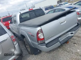 2012 Toyota Tacoma with VIN 3TMLU4ENXCM083340, listed as a IAAI auction lot 41704584 with 120,944 mi miles and . Bid and sale history available at DreamBid. Image 3.