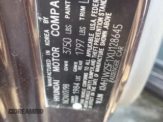 1999 Hyundai Elantra z VIN KMHJW25F1XU128645, wystawiony jako Copart lot #82970984 z przebiegiem 118 048 mil mil oraz Szkoda całkowita • Salvage title. Historia ofert i sprzedaży dostępna na DreamBid. Obrazek 12.