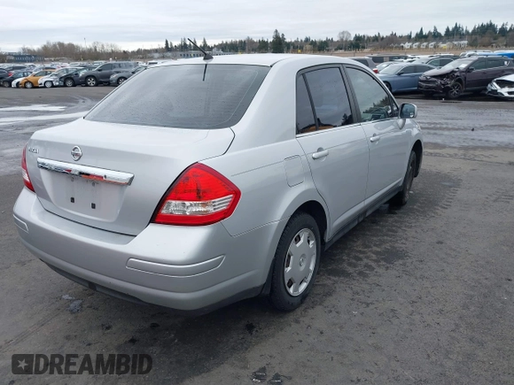 2007 Nissan Versa 1.8 SL with VIN 3N1BC11E97L447829, listed as a IAAI auction lot 41612386 with 123,500 mi miles. Bid and sale history available at carsss.com. Image 4.