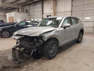 2017 Mazda CX-5 Sport with VIN JM3KFBBL1H0116157, listed as a IAAI auction lot 41584679 with 92,325 mi miles. Bid and sale history available at carsss.com. Image 2.