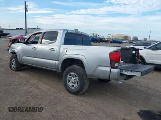 2022 Toyota Tacoma SR with VIN 3TYAX5GN8NT060017, listed as a IAAI auction lot 41504710 with 55,317 mi miles and . Bid and sale history available at DreamBid. Image 3.
