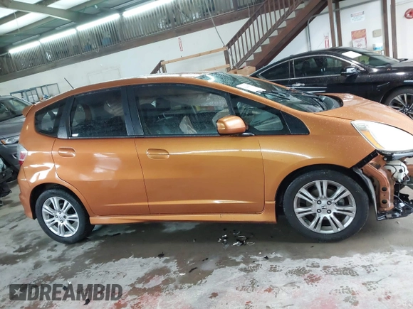 2009 Honda Fit Sport with VIN JHMGE88469S069328, listed as a IAAI auction lot 41464558 with 219,541 mi miles. Bid and sale history available at carsss.com. Image 13.