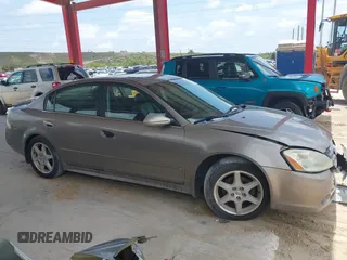 2003 Nissan Altima SE with VIN 1N4BL11D13C290488, listed as a IAAI auction lot 42357527 with 82,945 mi miles and . Bid and sale history available at DreamBid. Image 13.