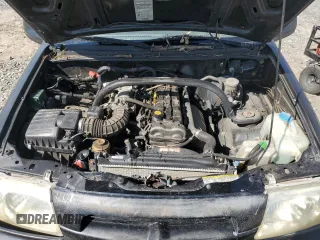 2000 Suzuki Vitara JLS z VIN 2S3TC52CXY6106646, wystawiony jako Copart lot #72450524 z przebiegiem 167 812 mil mil oraz Szkody całkowita. Historia ofert i sprzedaży dostępna na DreamBid. Obrazek 11.