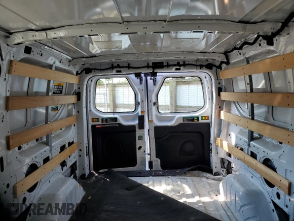 2023 Ford Transit Cargo with VIN 1FTBR1Y84PKA66581, listed as a Copart auction lot 62182335 with 19,897 mi miles and Clean title. Bid and sale history available at DreamBid. Image 10.