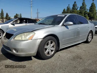 2002 Nissan Altima S with VIN 1N4AL11E42C718721, listed as a Copart auction lot 57655695 with 350,769 mi miles and Salvage title. Bid and sale history available at DreamBid. Image 1.