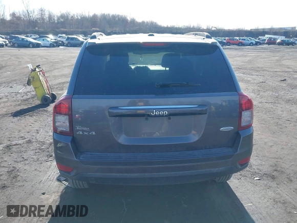 2017 Jeep Compass High Altitude with VIN 1C4NJDEB1HD111889, listed as a IAAI auction lot 41509294 with 104,038 mi miles. Bid and sale history available at carsss.com. Image 16.
