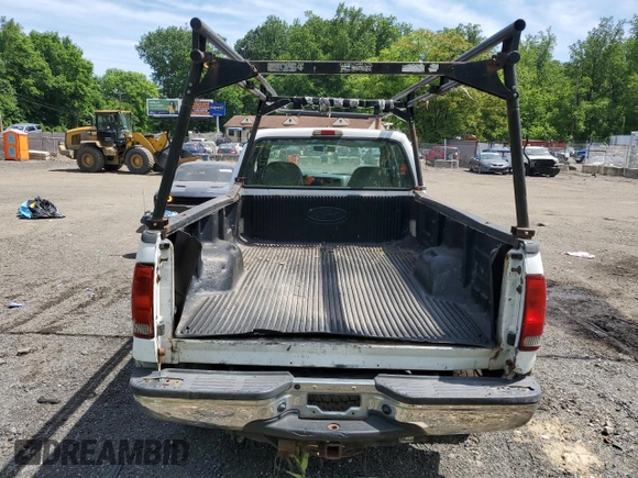 1999 Ford F-250 XL с VIN 1FTNX21F2XEC97057, выставлен на аукционе Copart как лот 57229085 с пробегом 352 998 миль миль и Списание • Salvage title. История ставок и продаж доступна на DreamBid. Изображение 6.