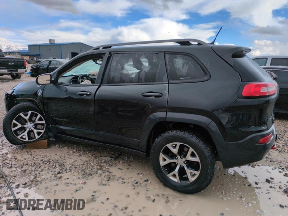 2014 Jeep Cherokee Trailhawk with VIN 1C4PJMBS1EW211570, listed as a Copart auction lot 51465845 with 156,320 mi miles and Salvage Title. Bid and sale history available at carsss.com. Image 2.